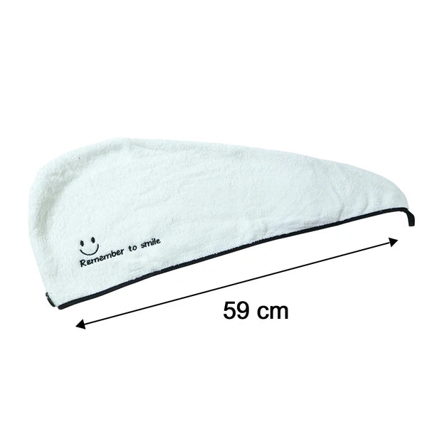 Woman wearing microfiber hair towel wrap in bathroom